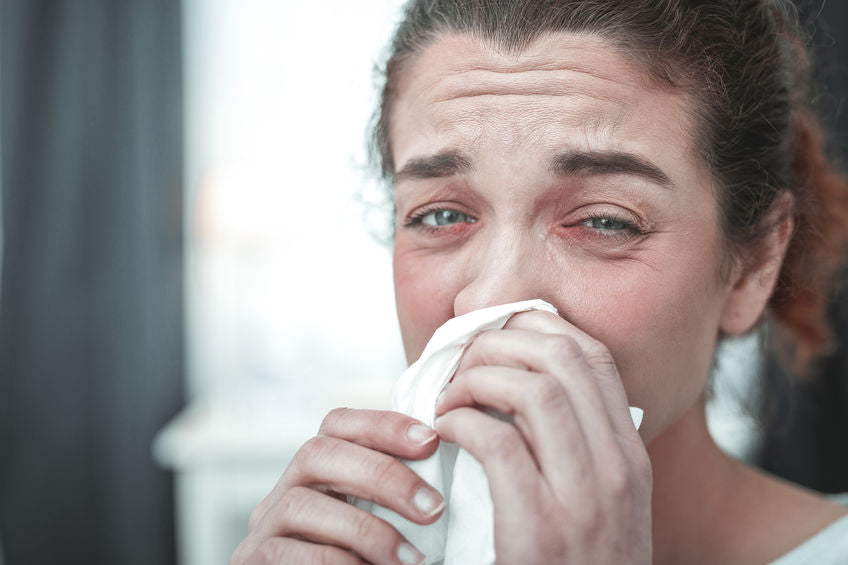 woman suffering from allergies