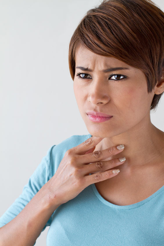 young woman with a sore throat
