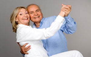middle-aged couple dancing