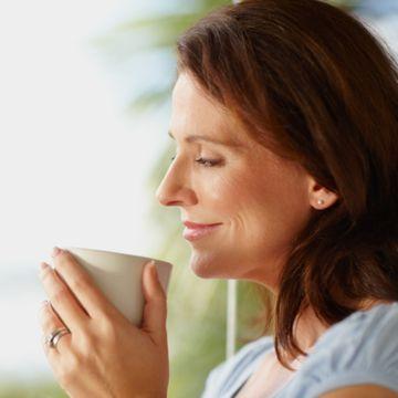 woman enjoying hot tea