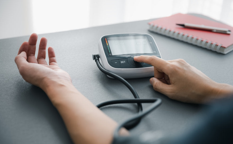 person taking blood pressure