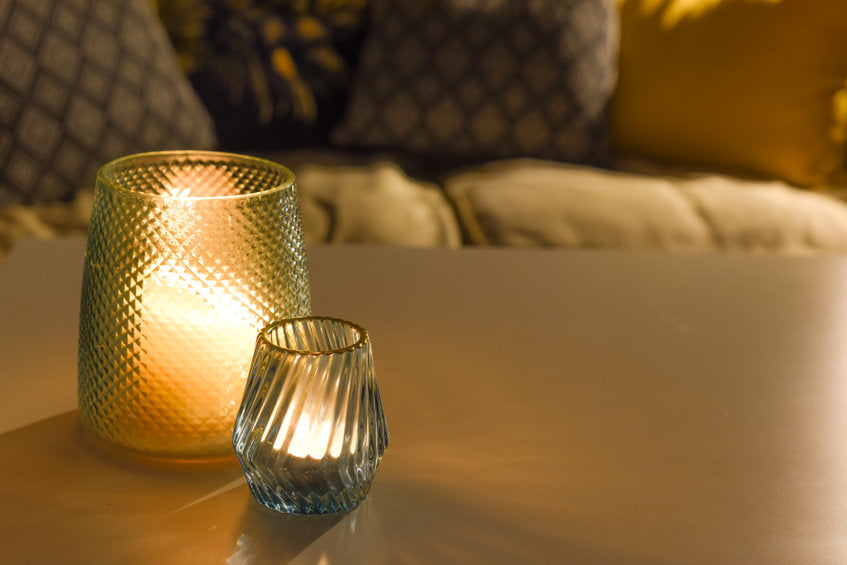 candles in votives on living room table