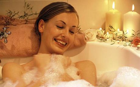young woman in bubble bath