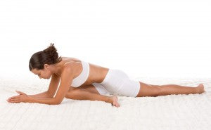woman doing a yoga stretch