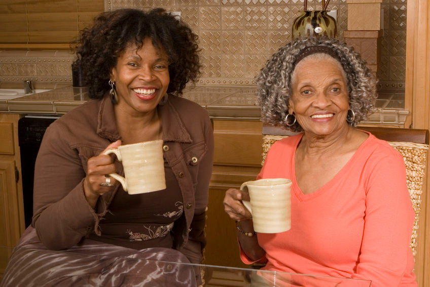 mother and daughter drinking coffee